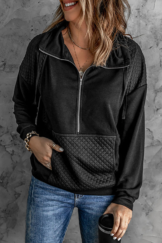 Happy girl wearing the Claudia PAtched Zipper Sweatshirt in black from Stella by Stacia
